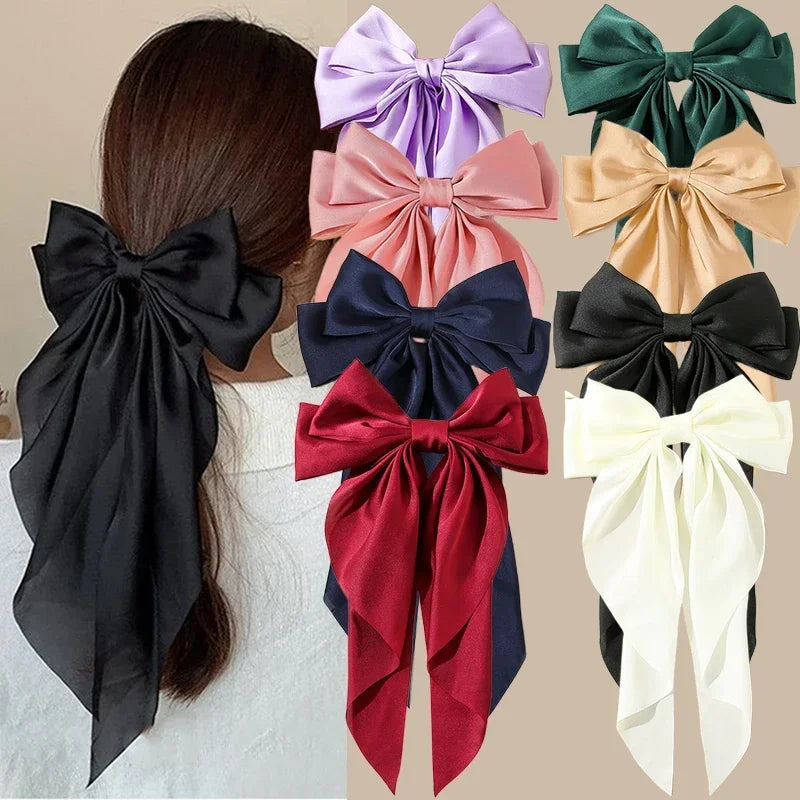Elegant satin bow hair clip with strong hold and soft feminine style.