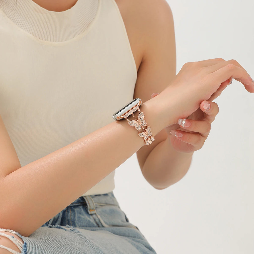 Shiny butterfly metal strap for Apple Watch with a stylish luxury look, fits multiple sizes and series.
