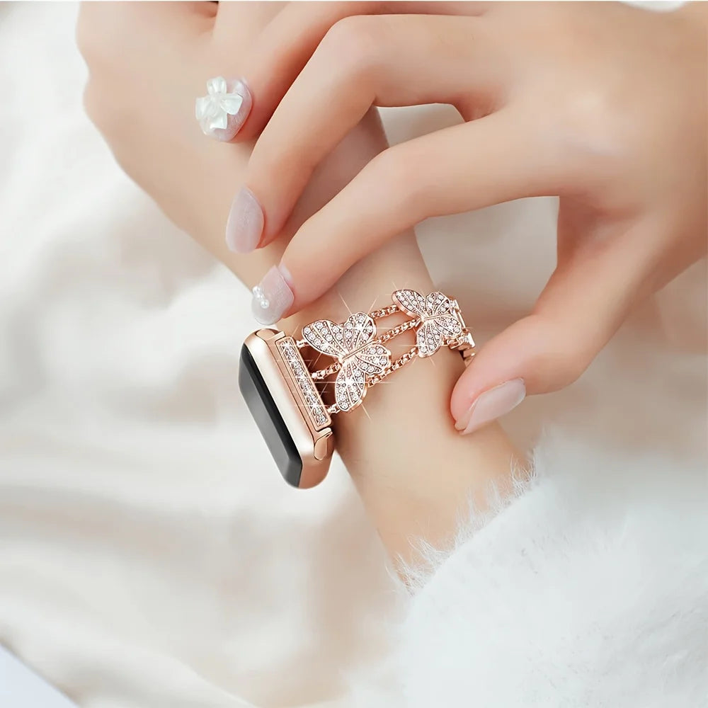 Shiny butterfly metal strap for Apple Watch with a stylish luxury look, fits multiple sizes and series.