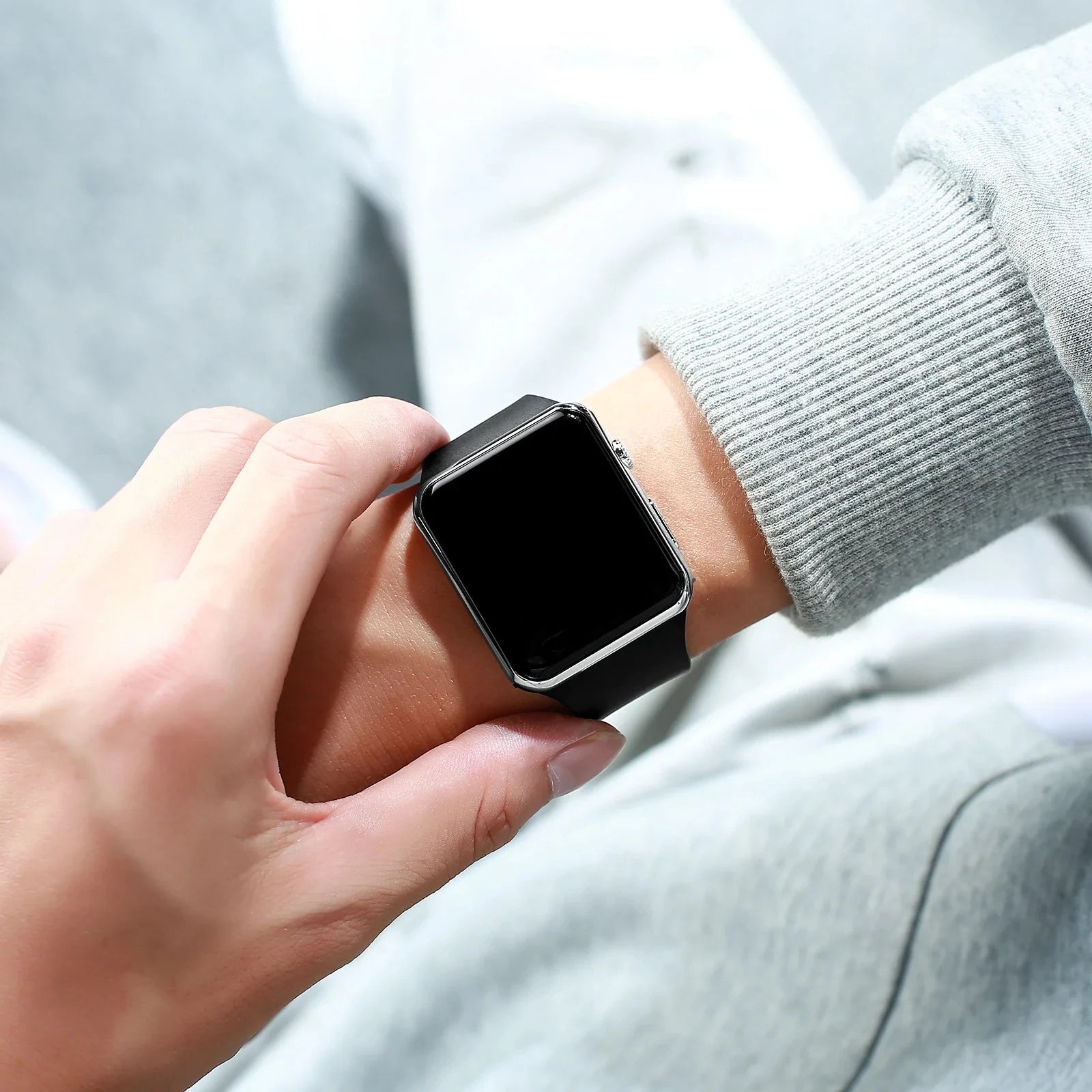 Minimalist LED sport watch with black silicone strap