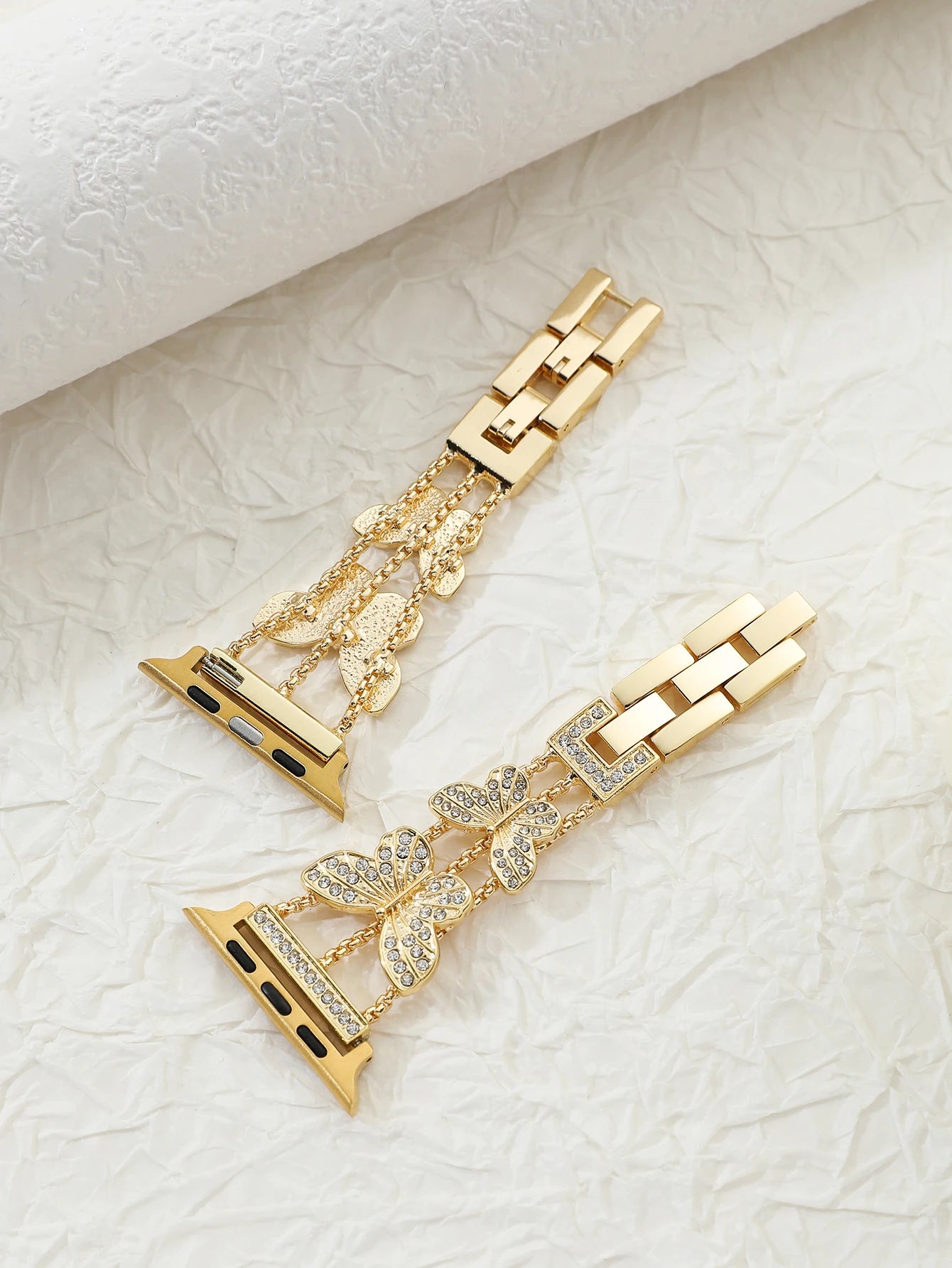Shiny butterfly metal strap for Apple Watch with a stylish luxury look, fits multiple sizes and series.
