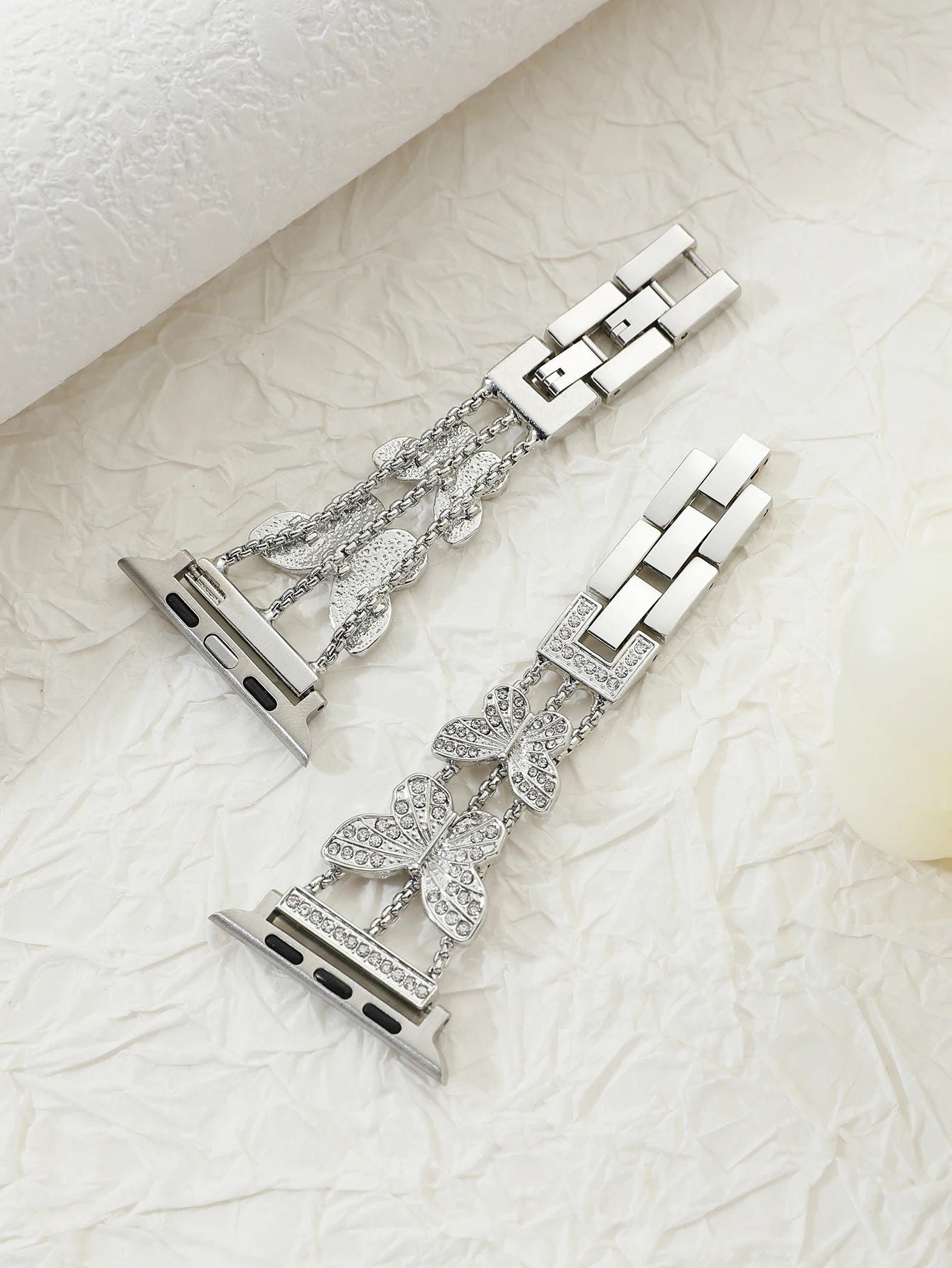 Shiny butterfly metal strap for Apple Watch with a stylish luxury look, fits multiple sizes and series.